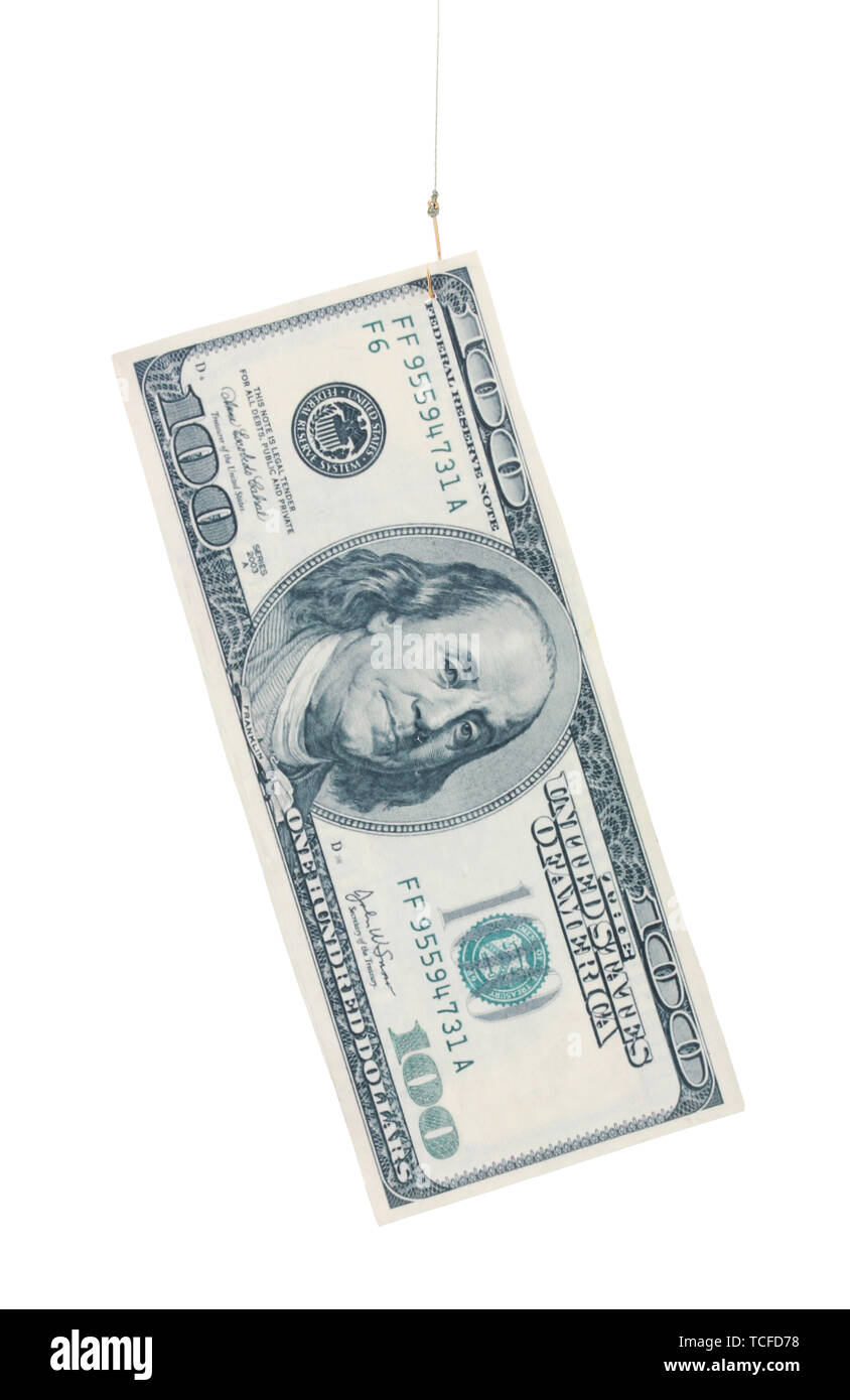 Geld für Fisch Haken isoliert auf weißem Stockfoto