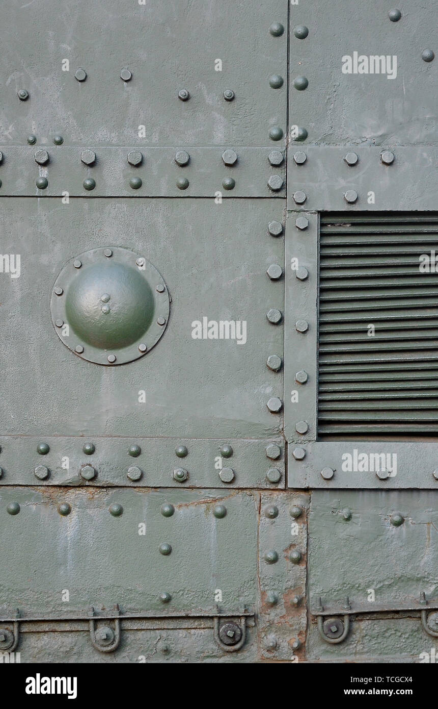 Abstrakt Grun Industrial Metal Strukturierten Hintergrund Mit Nieten Und Schrauben Alte Lackiertem Metall Hintergrund Detail Der Militarischen Tank Oberflache Korrosion Meta Stockfotografie Alamy