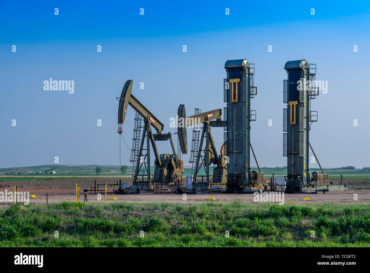 Jack Pumpen in Betrieb in der Bakken spielen Ölfelder in der Nähe von Williston, North Dakota, USA. Stockfoto