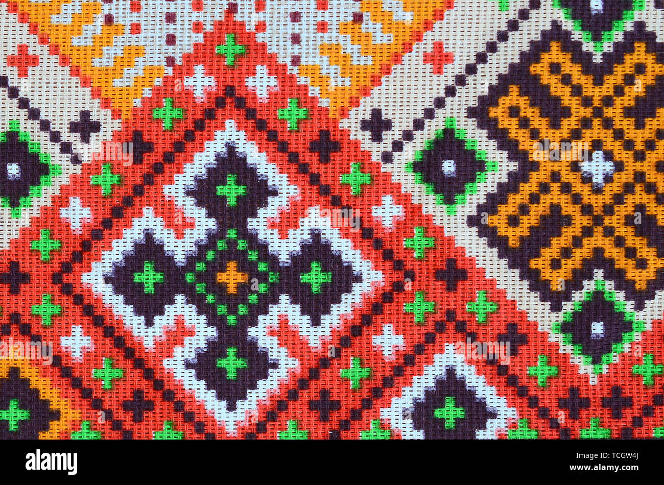 Traditionelle ukrainische Volkskunst aus Gewirken Stickmuster auf Gewebe. Farbige pixel Design aus Segeltuch. Stockfoto