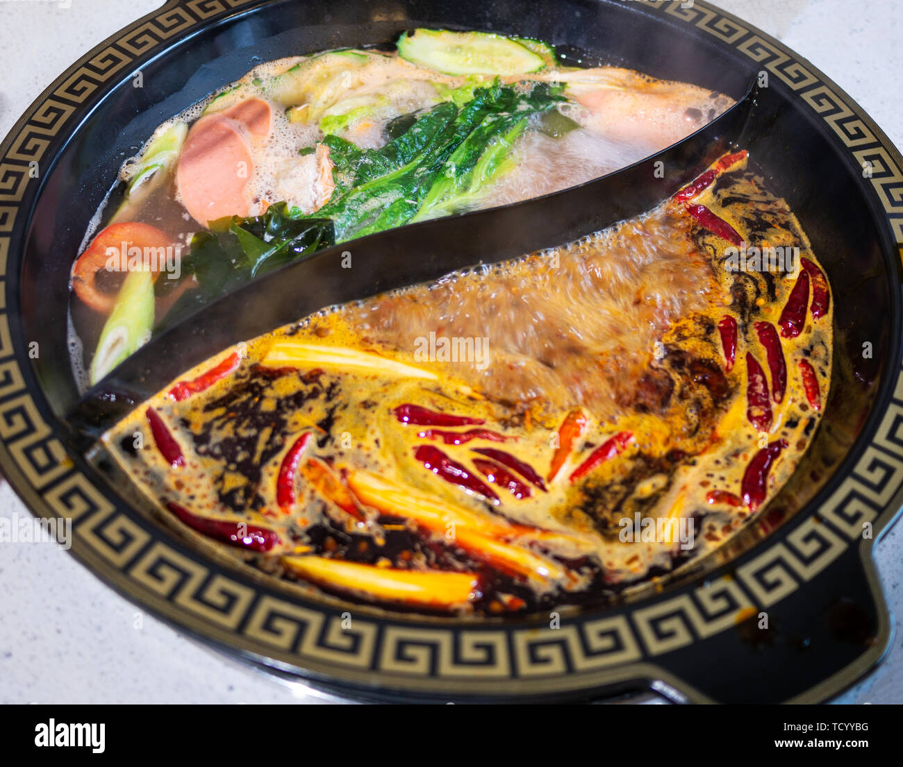 Siedepunkt Mandarinente hotpot Stockfoto