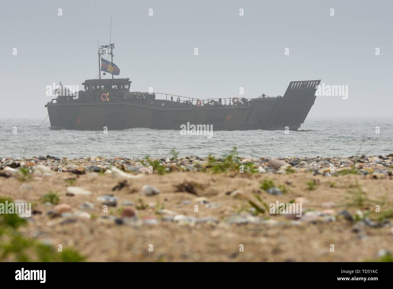 11.06.2019, seit Montag, dem 10. Juni die britische Royal Navy amphibische Kriegsführung verwaltet mit dem Landing Craft der HMS Albion in der nördlichen Eckernforder Bucht in der Nähe des Campingplatz Gut Ludwigsburg in der Nähe von langholz als Teil der Manovers BALTOPS 2019. LCU Mk 10 L9734ist vor Anker warten auf die Bereitstellung. | Verwendung weltweit Stockfoto