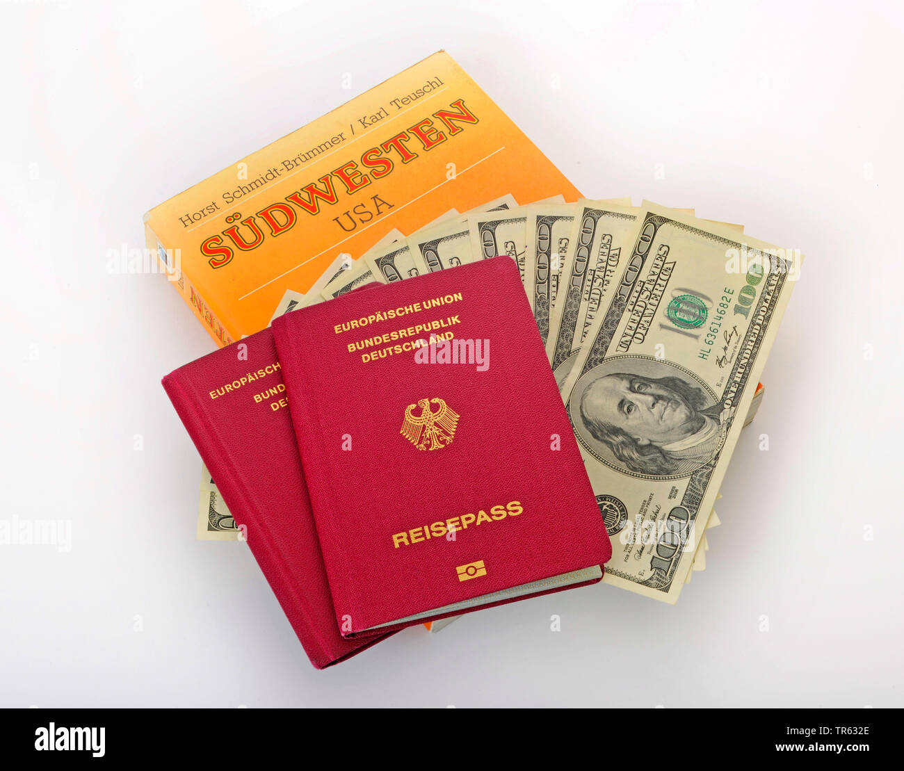 Id Karten und Reiseführern mit Dollarnoten, Deutschland Stockfoto
