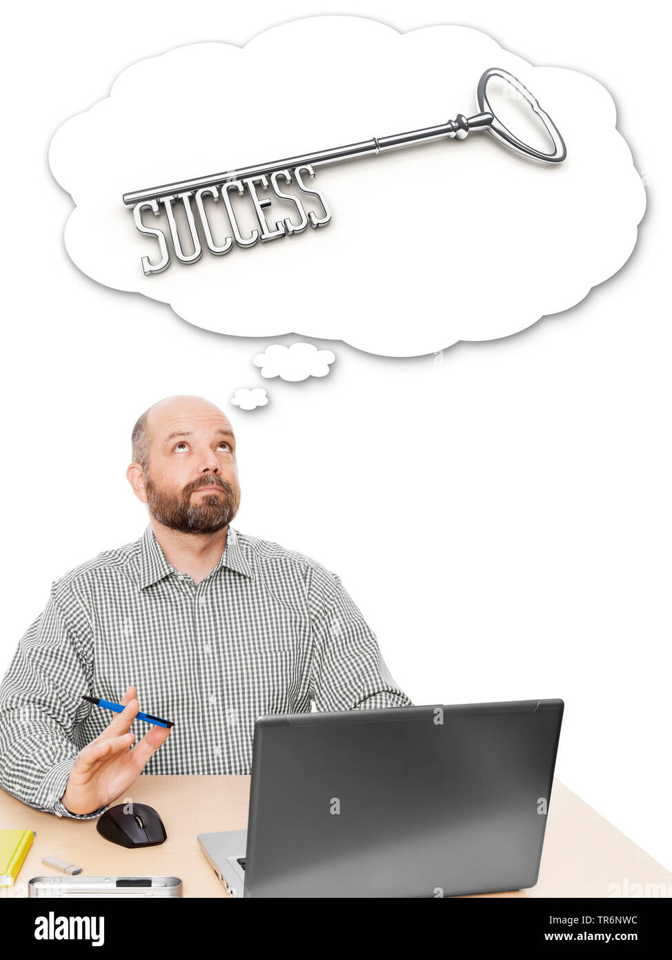 Mann sitzt einer der Schreibtisch Träumen der Schlüssel zum Erfolg, Deutschland Stockfoto