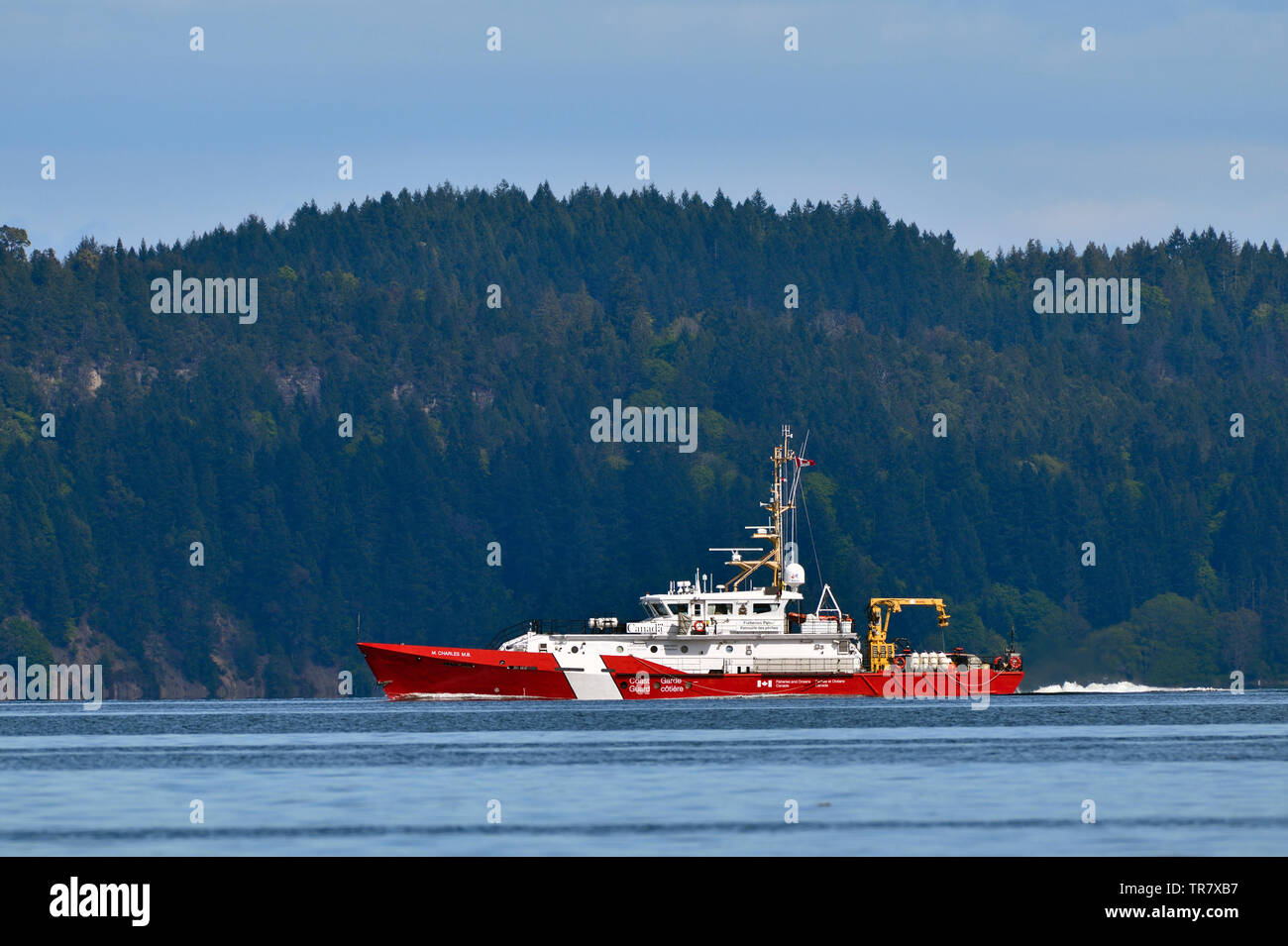 Eine Seitenansicht eines Küstenwache Schiff durch die Meerenge von Georgia in der Nähe von Vancouver Island, British Columbia Reisen Stockfoto