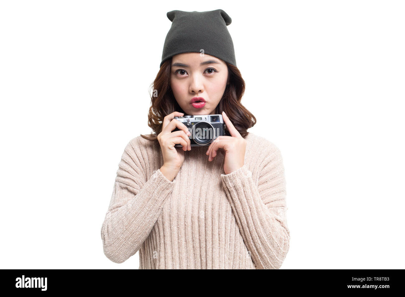 Junge Frau Holding Kamera Stockfoto