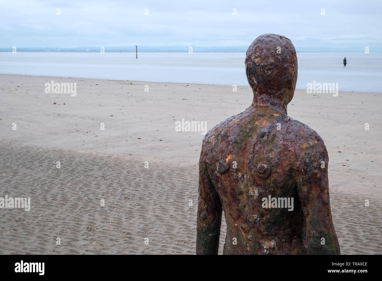 Antony Gormley Ein weiterer Ort kunst Installation, Crosby Strand, Liverpool Stockfoto