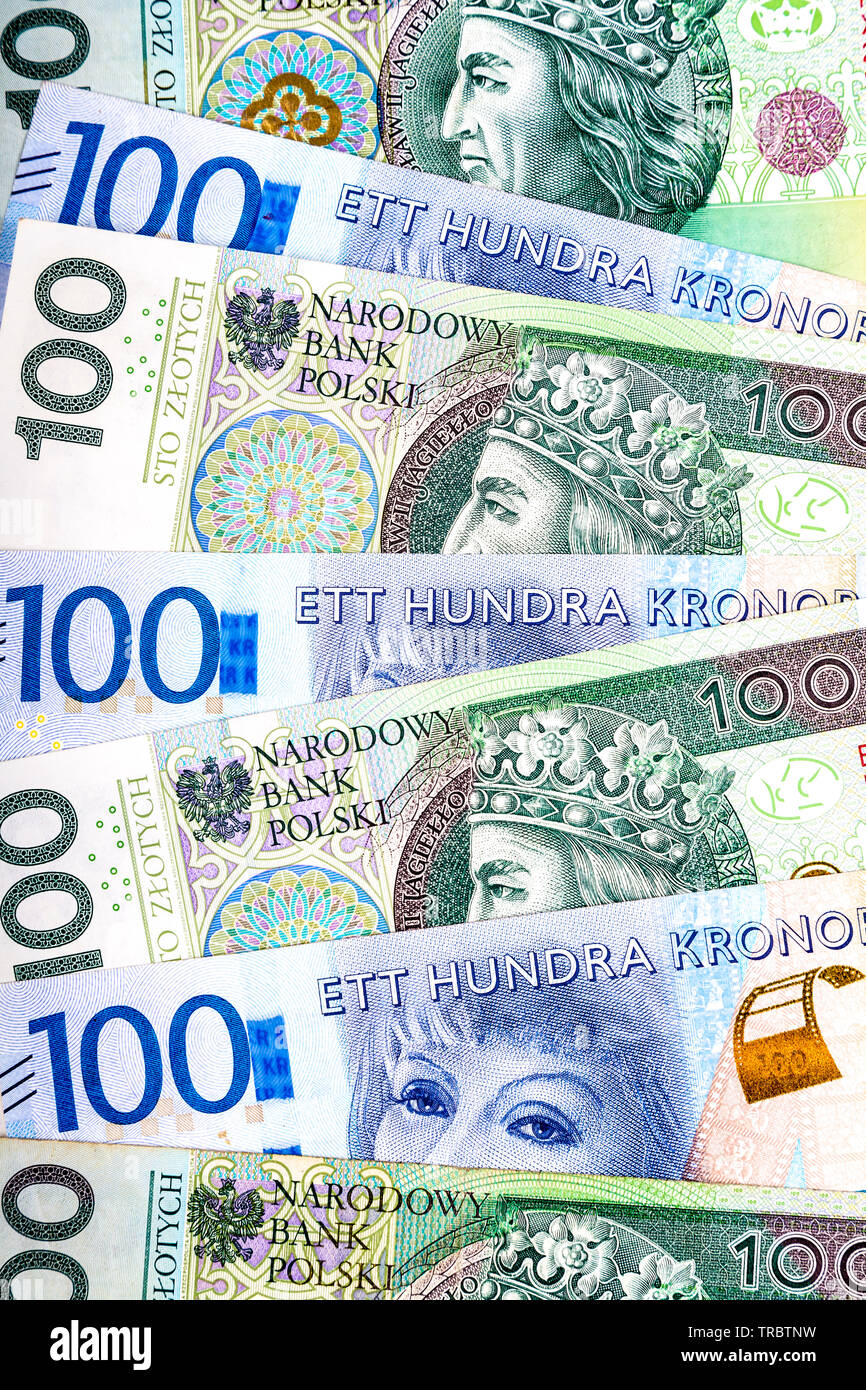 Mischung aus verstreuten Polnische Zloty 100 Anmerkungen und die Schwedische Krone 100 Anmerkungen Hintergrund Stockfoto