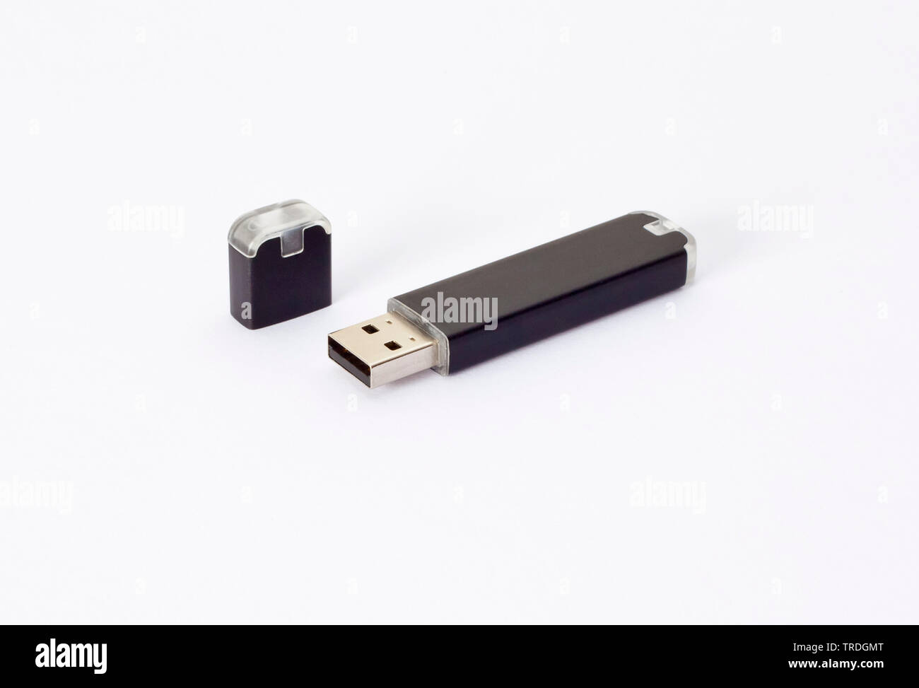 3D Computer Grafik, USB-Stick mit schwarzer Oberfläche vor weißem Hintergrund Stockfoto