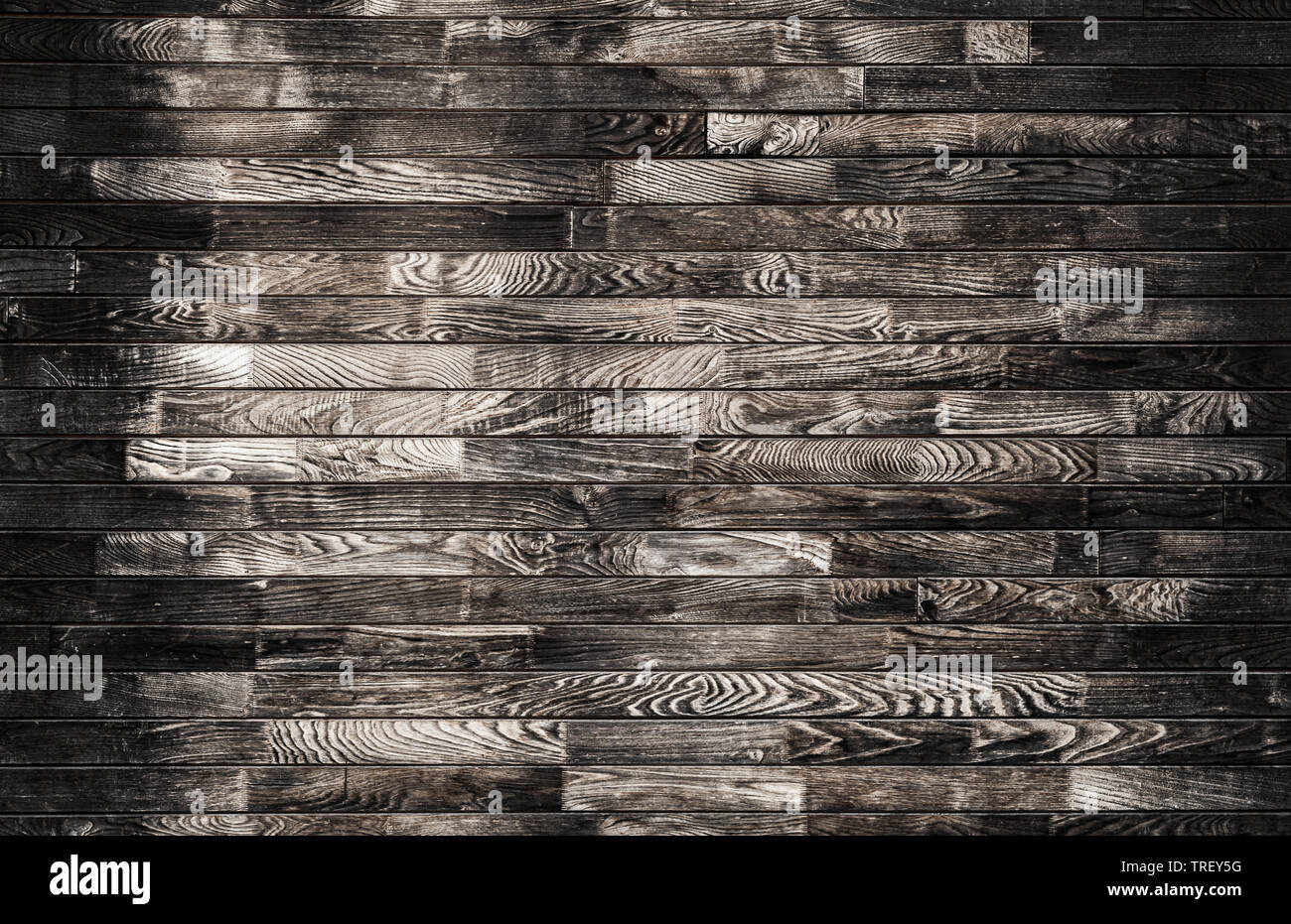Aus dunklem Holz wand hintergrund Textur mit Vignette-effekt Stockfoto