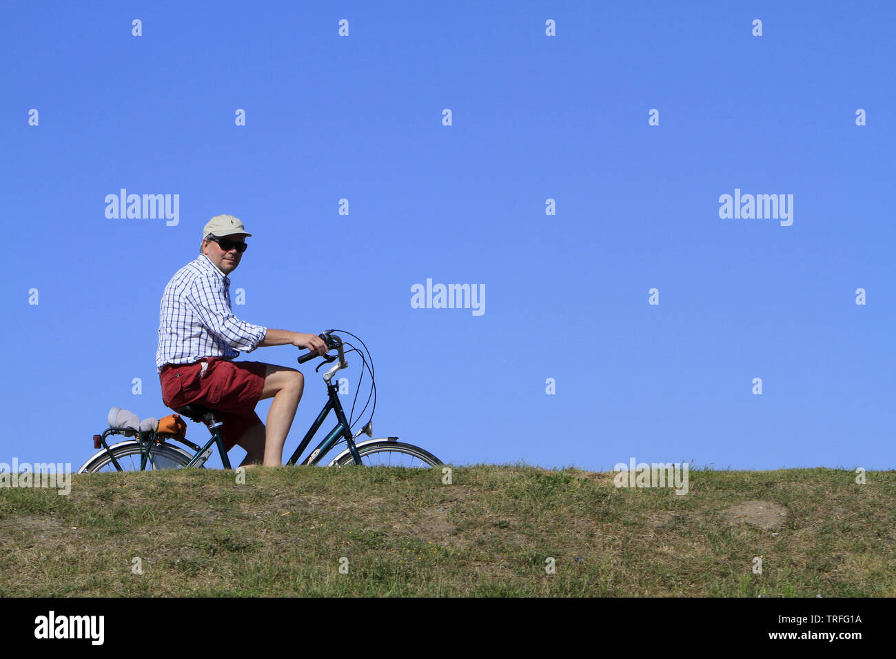 Cycliste en Ballade. Stockfoto