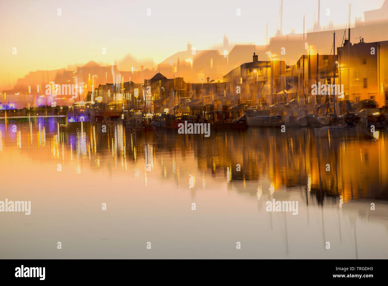 Eine absichtliche Doppelbelichtung genommen mit einem Zoomobjektiv von Weymouth Hafen in Dorset Stockfoto