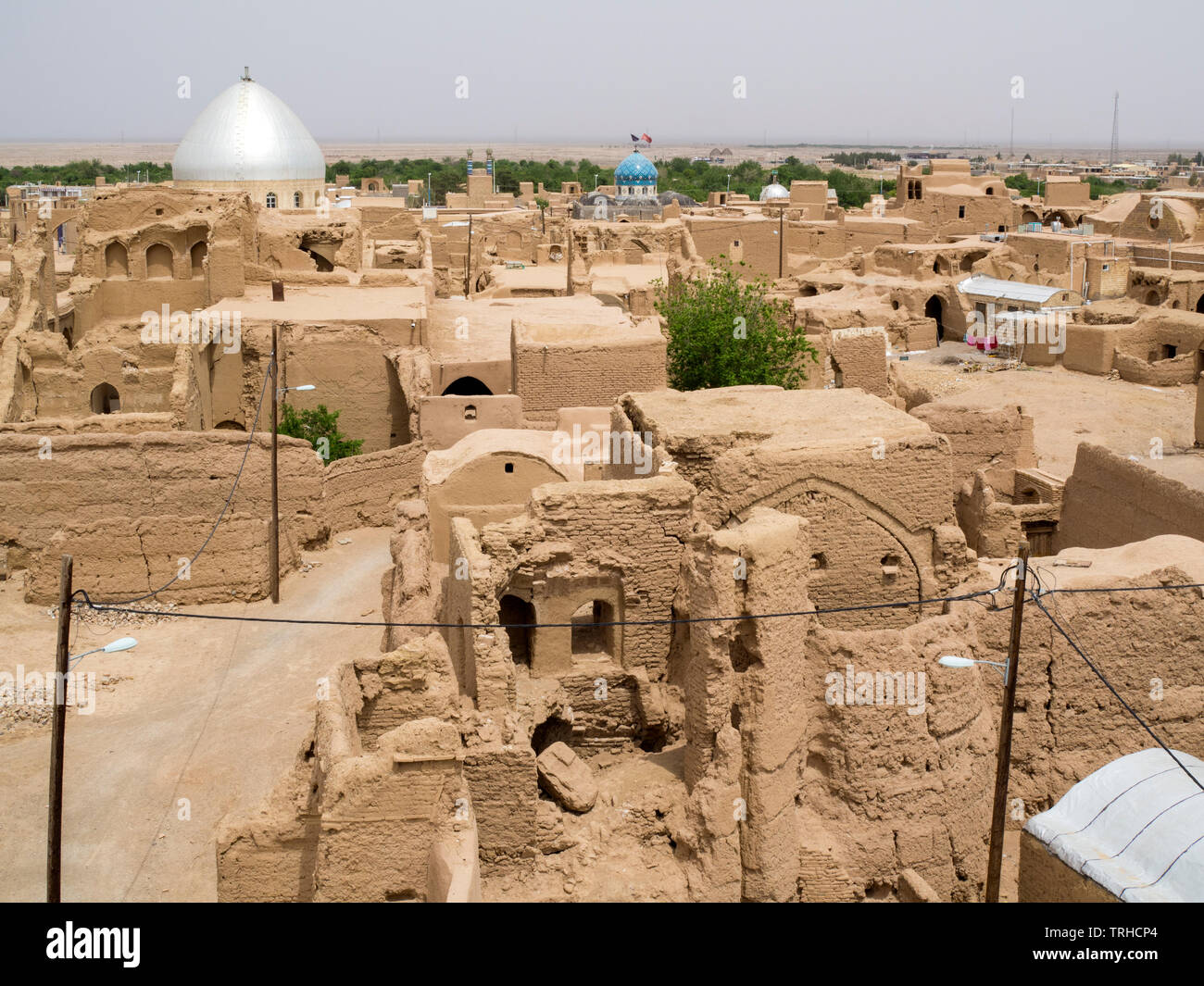 Ein Blick über die Stadt Aqda, Provinz Yazd, Iran. Die antike Stadt und caravansarai werden für Tourismus restauriert. Stockfoto