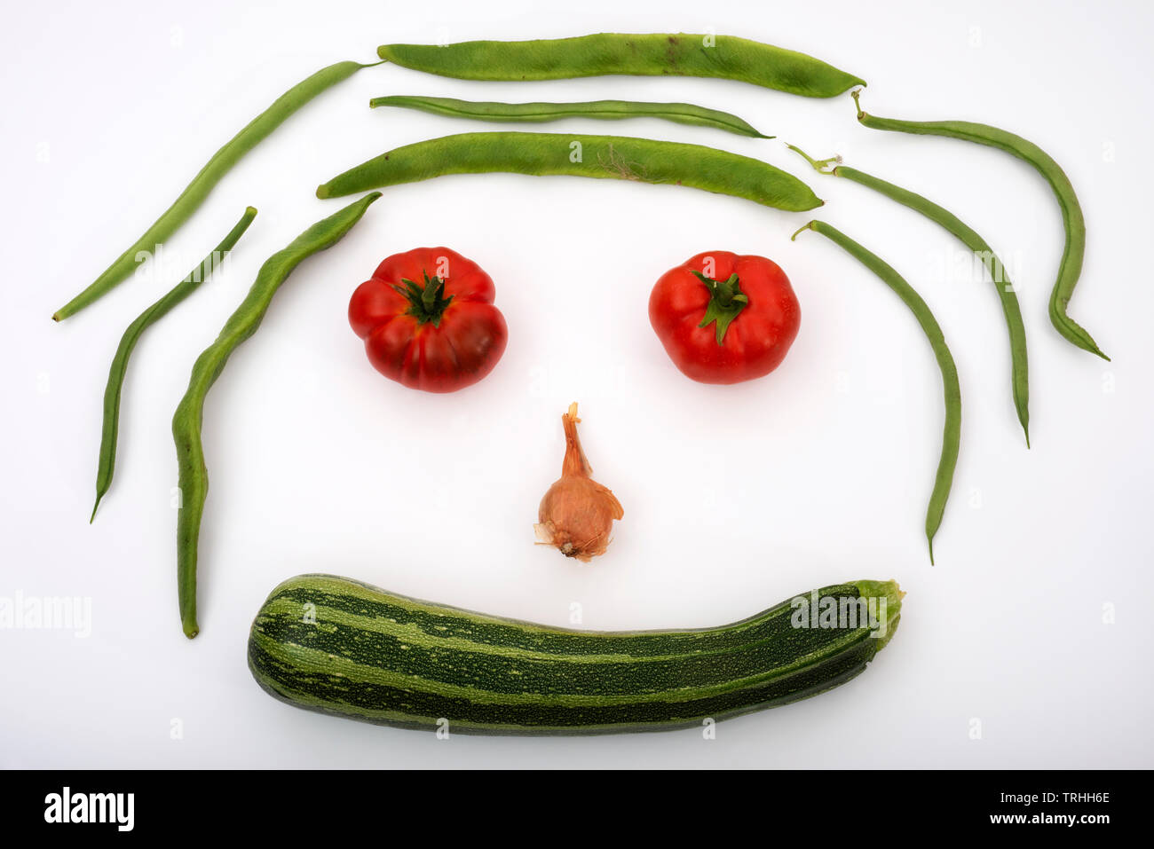 Organisch Garten Gemüse in der Form eines Gesichts gewachsen Stockfoto