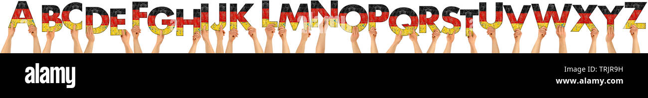 Alphabet abc Gruppe von Menschen die Buchstaben aus Holz mit Deutschland deutsche Fahne Farben auf weißem Hintergrund design pattern selbst isoliert Bauen Stockfoto