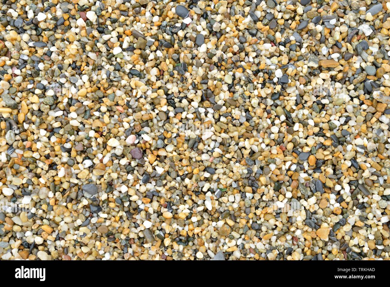 Strand farbige Körner Sand Hintergrund Stockfoto