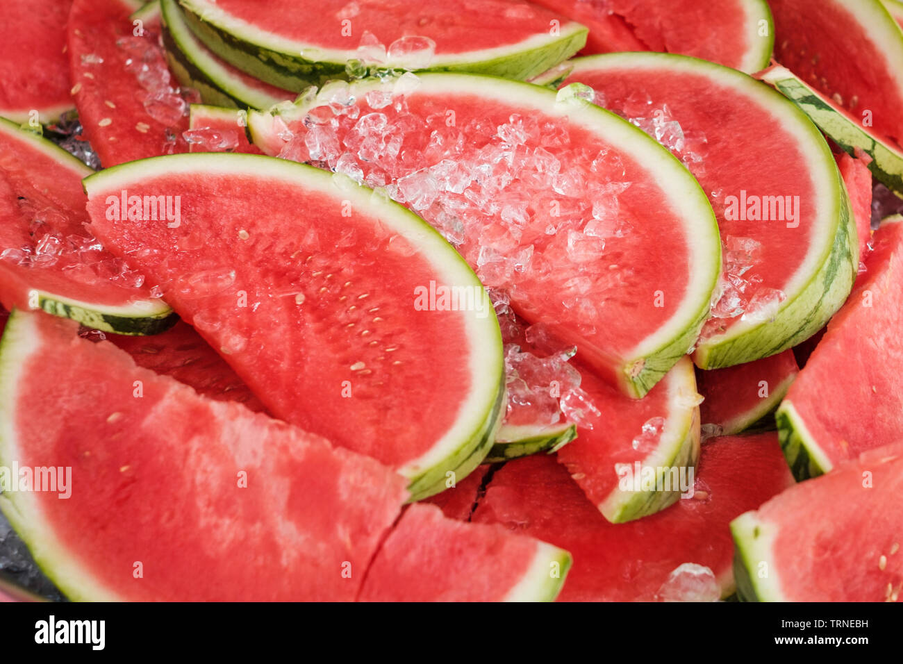 Wassermelone und Eis, Scheiben frische Wassermelone Stockfoto