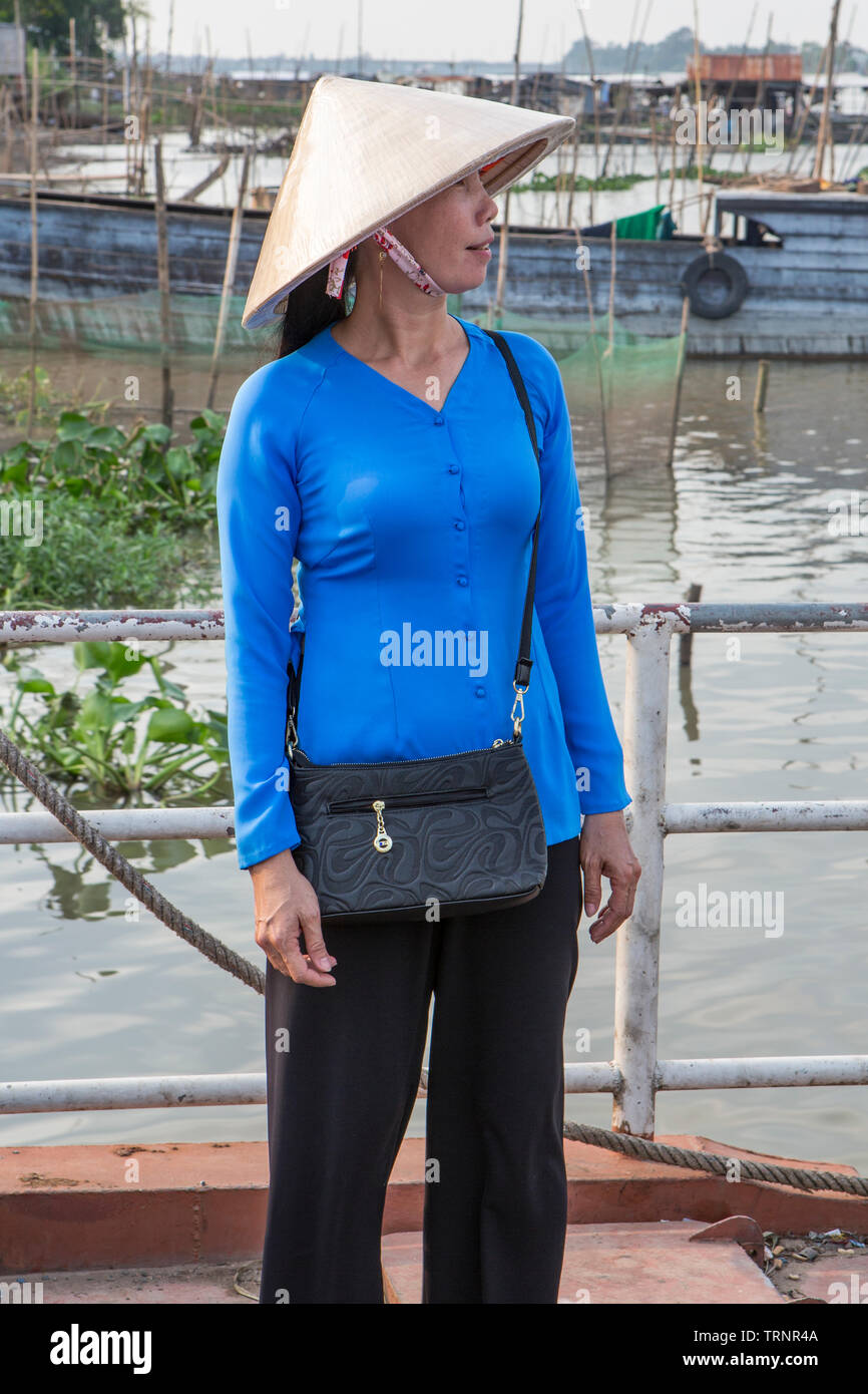 Eine Pandaw Cruise Line Tour Guide auf dem Mekong Fluss, Vietnam. Stockfoto