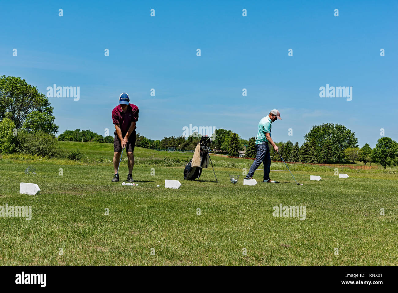 Golfspieler auf der Driving Range Stockfoto