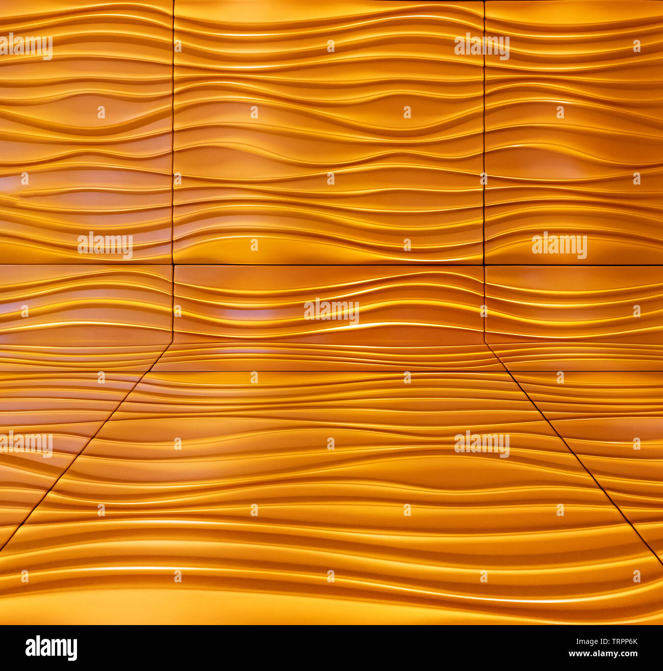 Wave orange gelb Muster Wand abstrakt Hintergrund Stockfoto