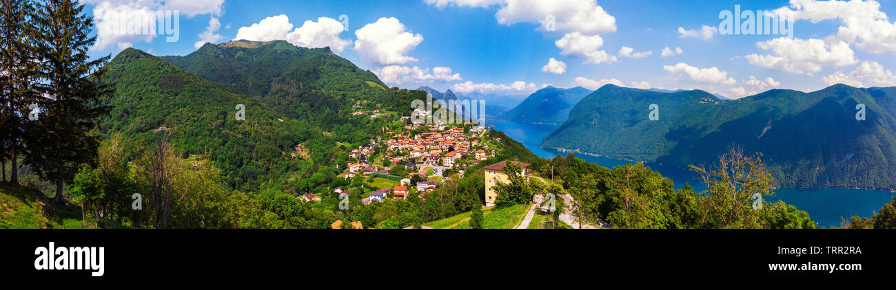 Schöne Panoramasicht auf die Bre Stadt über Lugano mit Lugano See in der Schweiz Stockfoto