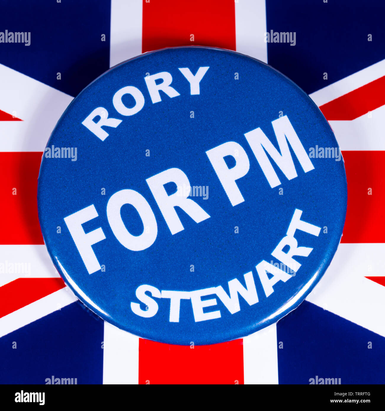 London, UK, 11. Juni 2019: ein Abzeichen mit Rory Stewart für Premierminister, dargestellt über die Flagge von dem Vereinigten Königreich. Rory Stewart ist einer der Kämpfer zu Stockfoto