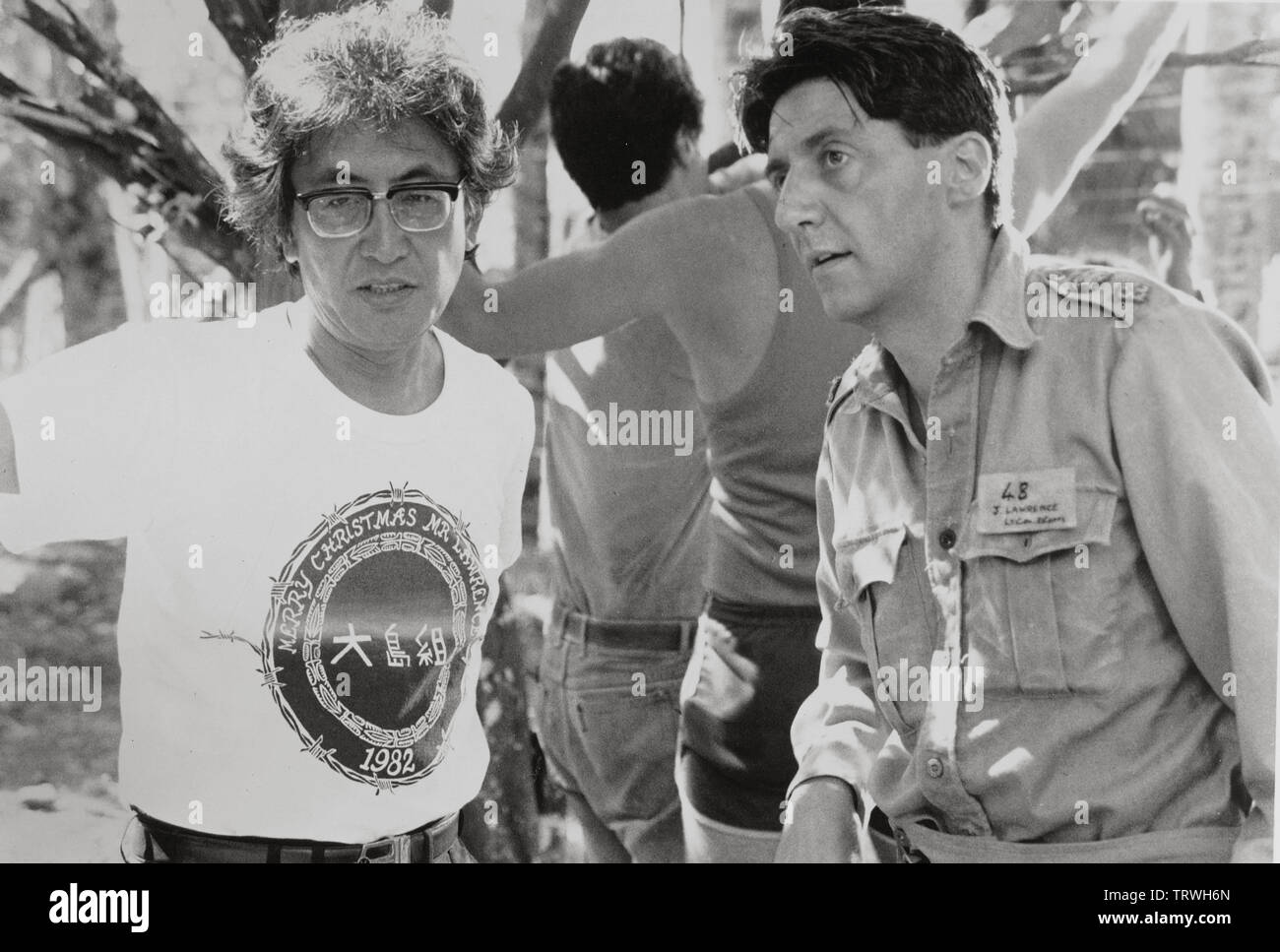 NAGISA OSHIMA und TOM CONTI IN MERRY CHRISTMAS, Mr. Lawrence (1983). Copyright: Nur die redaktionelle Nutzung. Kein Merchandising oder Buch deckt. Dies ist eine öffentlich verteilten Handzettel. Zugriffsrechte nur, keine Lizenz des Urheberrechts zur Verfügung gestellt. Nur in Verbindung mit Werbung für diesen Film. Credit: PIC-CINEVENTURE - Asahi/Universal/Album Stockfoto