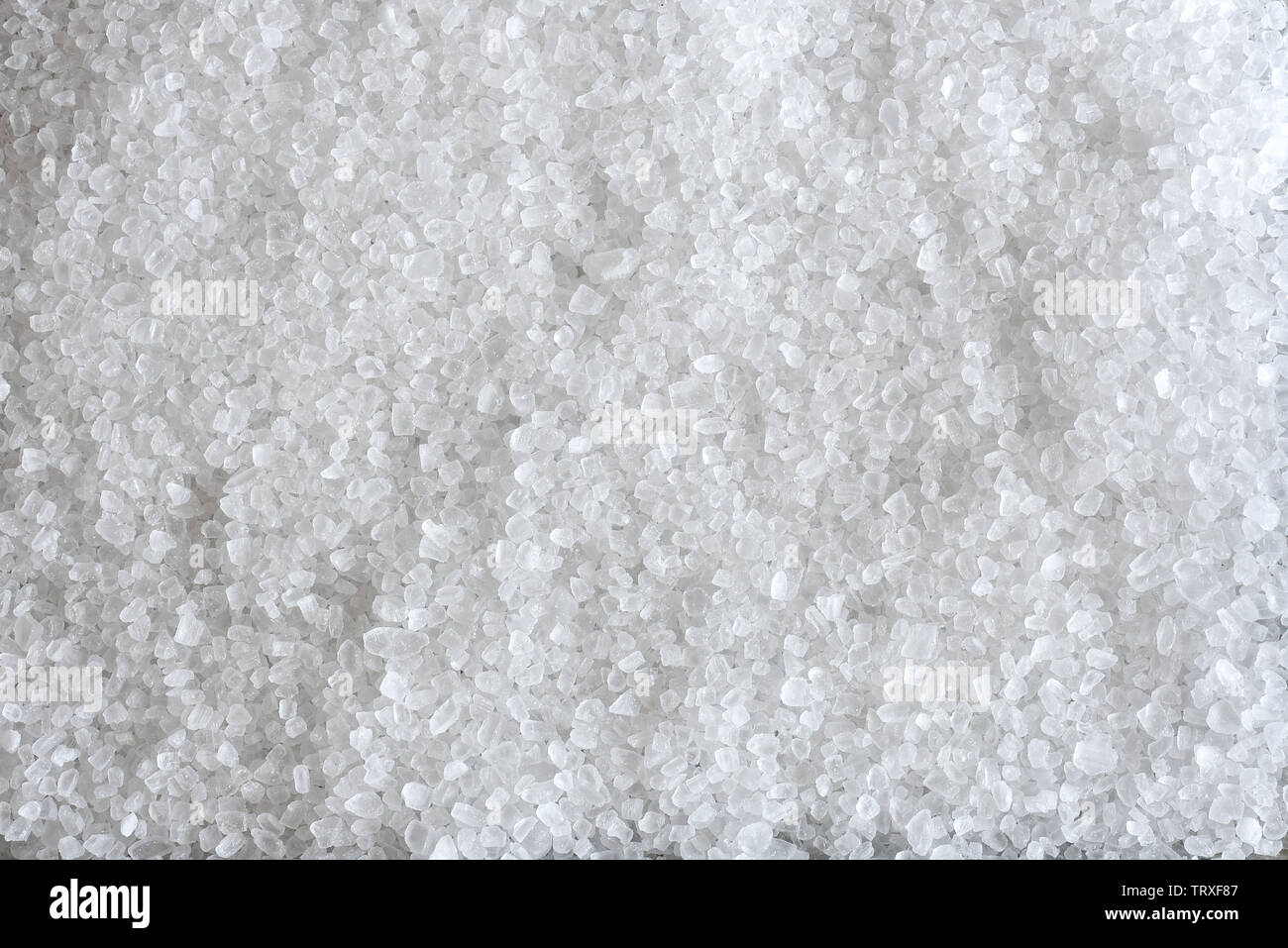 Geglättet grobes Meersalz schafft interessante Designs. Stockfoto