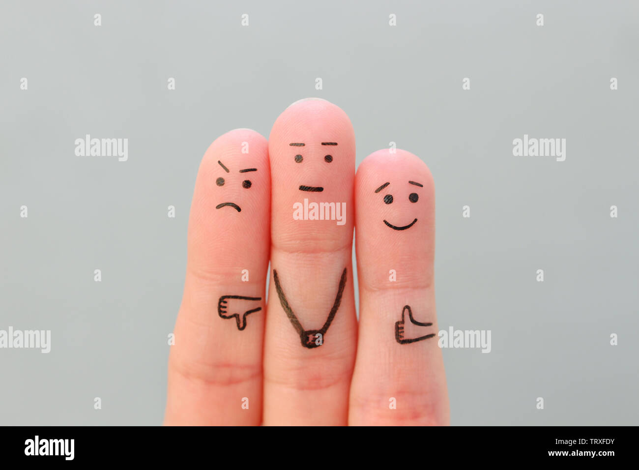 Finger Kunst des Menschen. Konzept der positiven und negativen Emotionen. Stockfoto