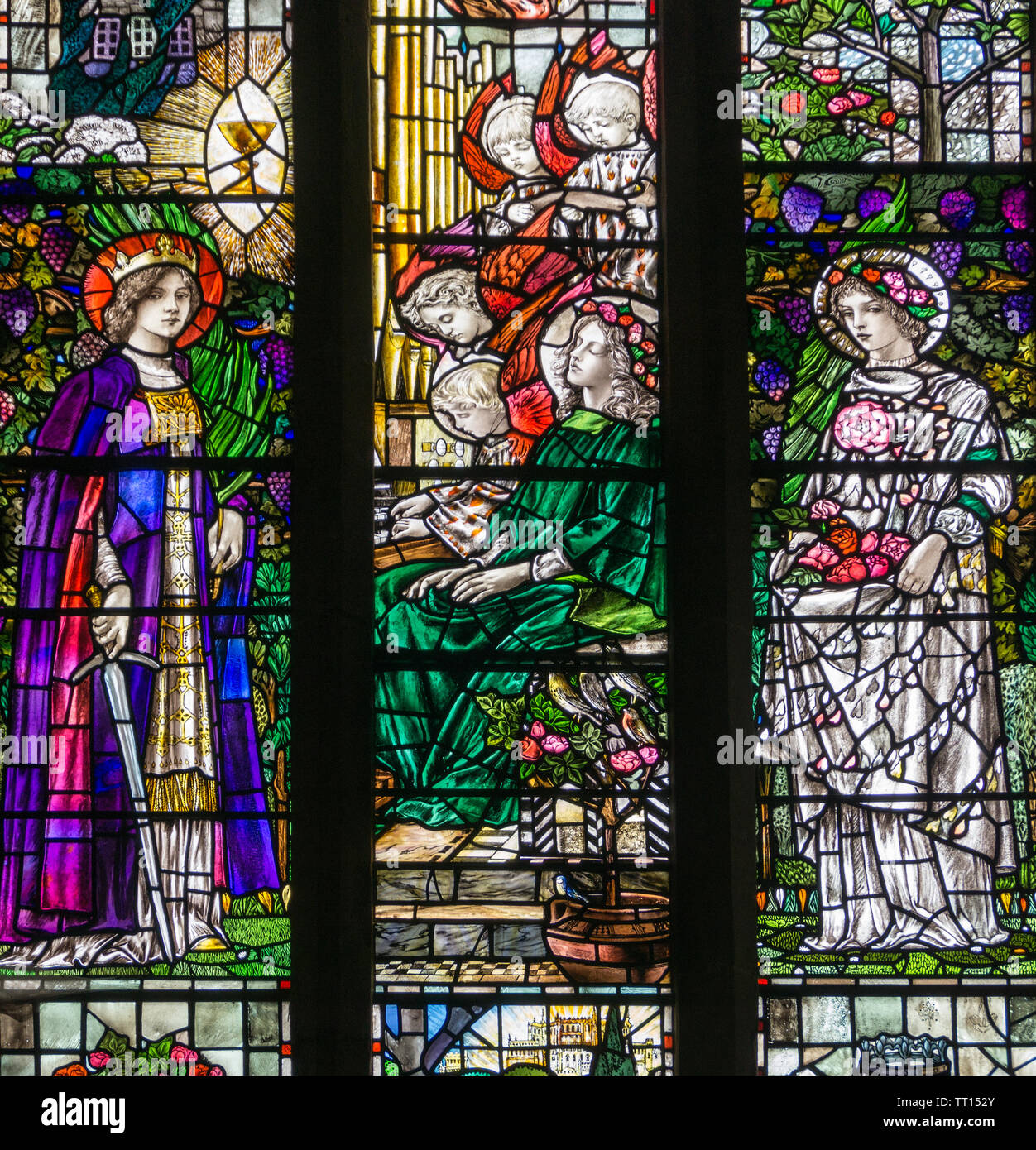 Glasmalerei Detail aus der Turnbull Memorial Fenster, St. Oswalds Kirche, Ashbourne, Derbyshire, UK; aus dem Jahr 1905 von dem Künstler Christopher Whall Stockfoto