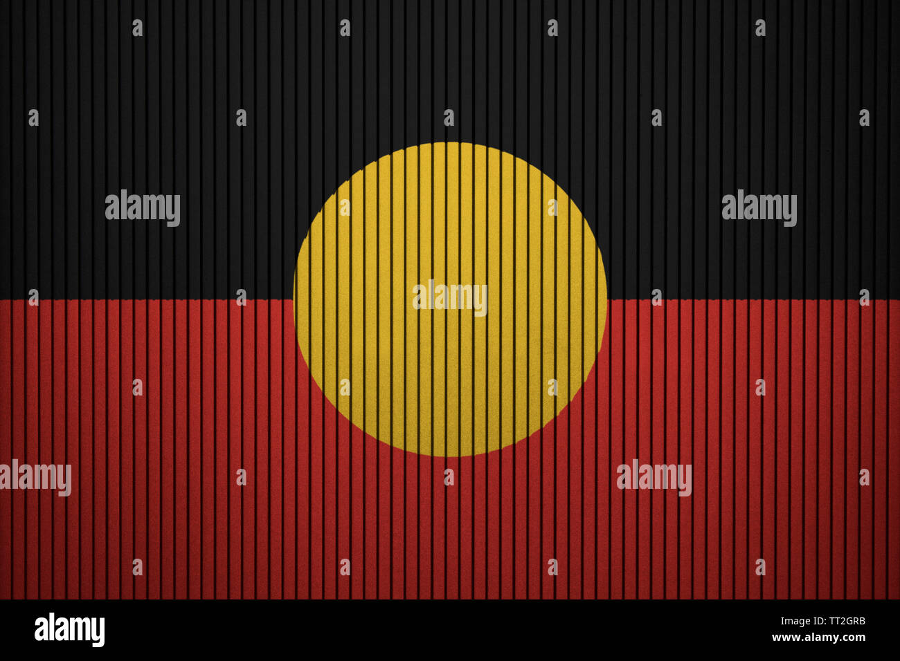 Australian Aboriginal Flagge auf dem gebrochenen grunge Beton Wand gemalt Stockfoto