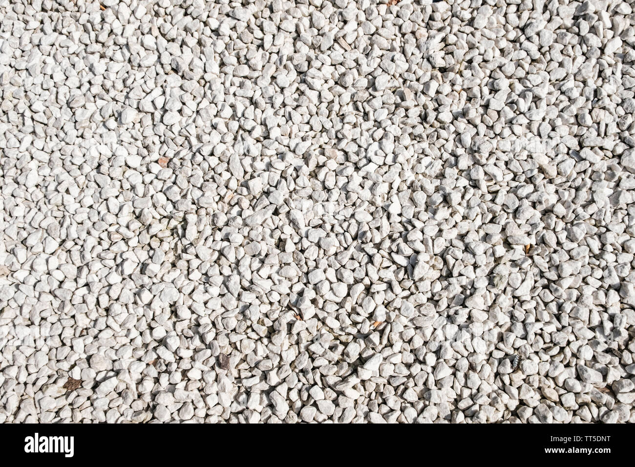 Weiße Steine für den Garten Dekoration Hintergrund - weiße Kieselsteine Stockfoto
