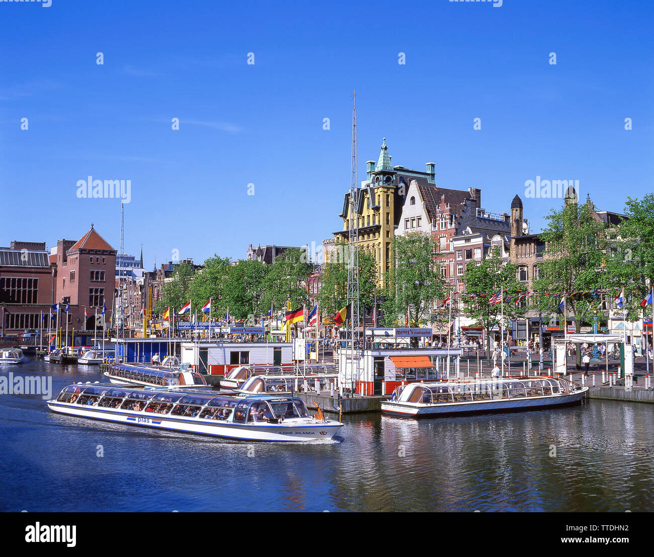 Canal Ferry Terminal, Damrak, Amsterdam, Noord-Holland, Königreich der Niederlande Stockfoto