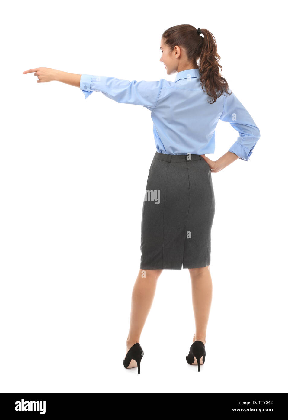 Junge Geschäftsfrau zurück auf weißem Hintergrund Stockfoto