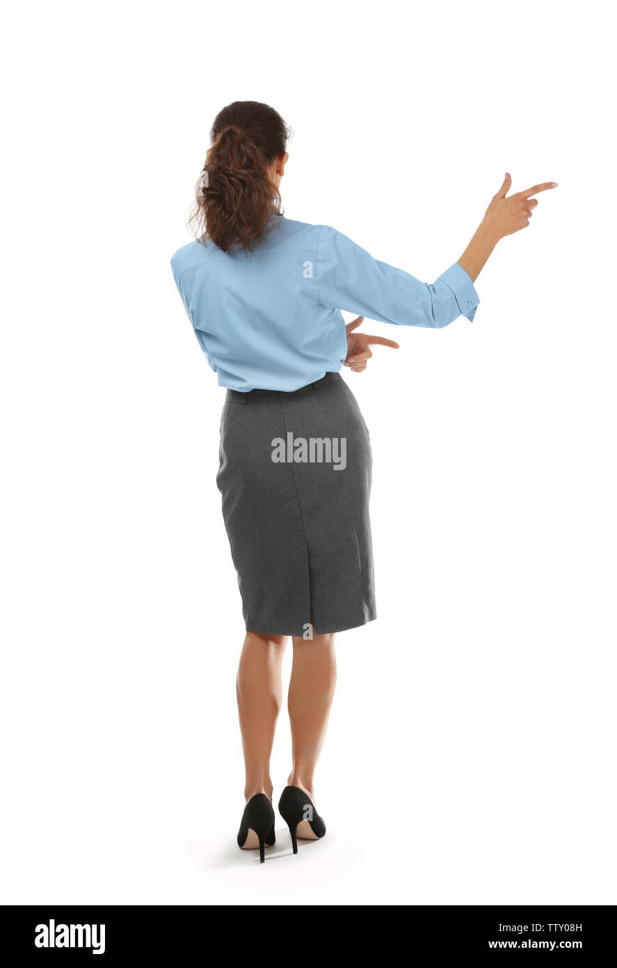Junge schöne Geschäftsfrau zurück auf weißem Hintergrund Stockfoto