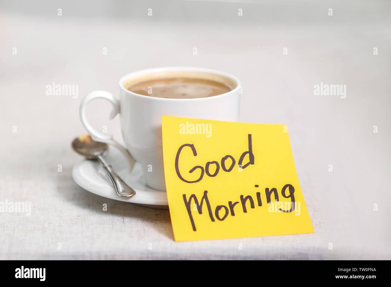 Tasse Kaffee mit Hinweis Guten Morgen Stockfoto