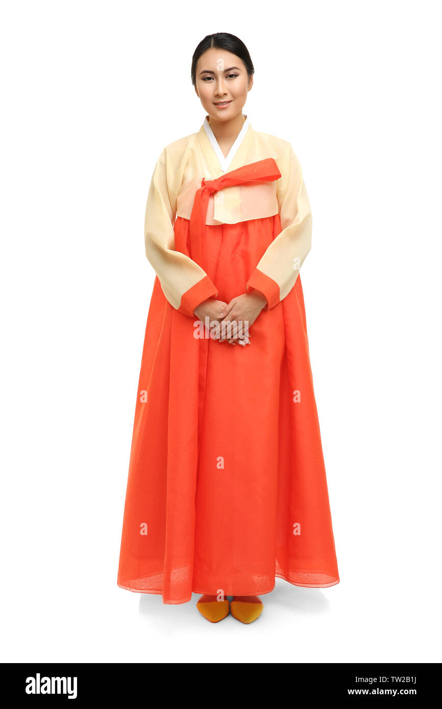 Schöne junge Frau in die traditionelle koreanische Tracht auf weißem Hintergrund Stockfoto