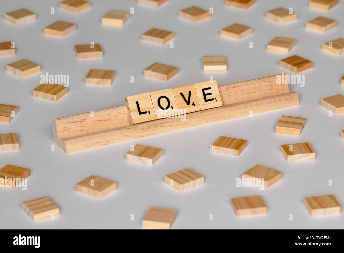 Scrabble Spiel Holz Fliesen Rechtschreibung 'Liebe' Stockfoto