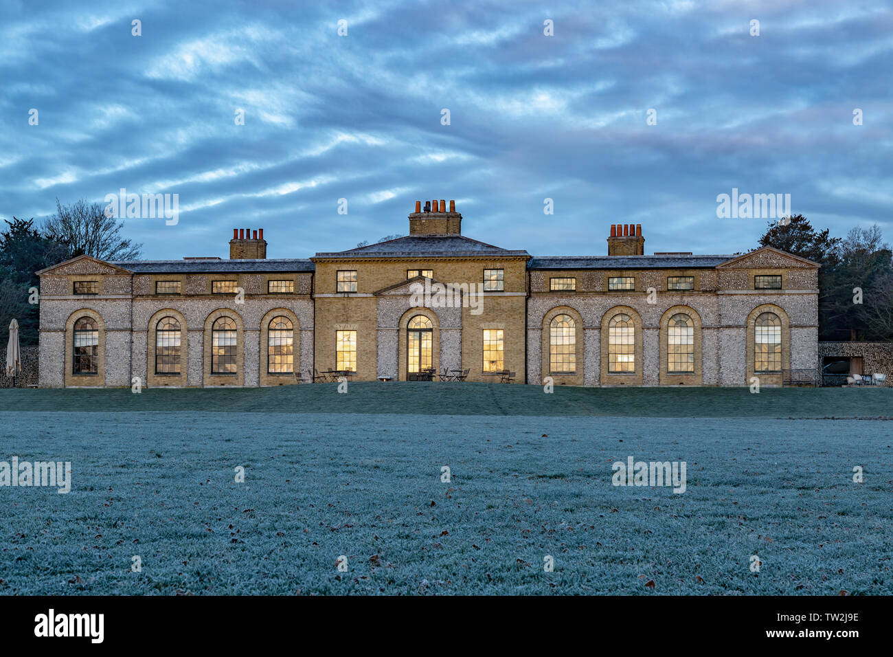 Am frühen Morgen reflektierende Licht schlagen die Zwinger Restaurant in Goodwood auf dem Goodwood Estate Stockfoto