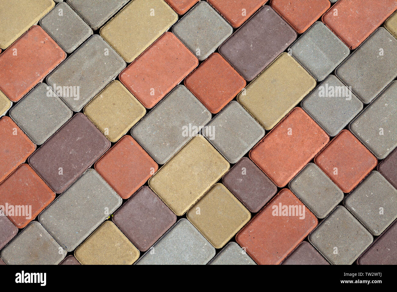 Foto von bunten Pflastersteinen Muster und Hintergrund Stockfoto