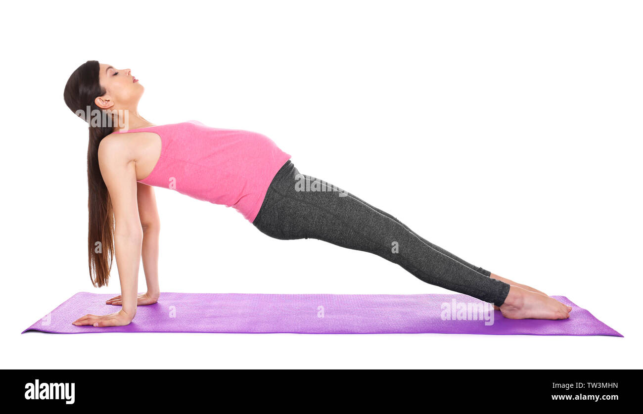 Junge schöne Schwangere Yoga Übung isoliert auf weißem Stockfoto