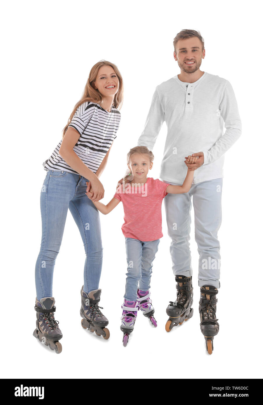 Familie auf Rollschuhen vor weißem Hintergrund Stockfoto