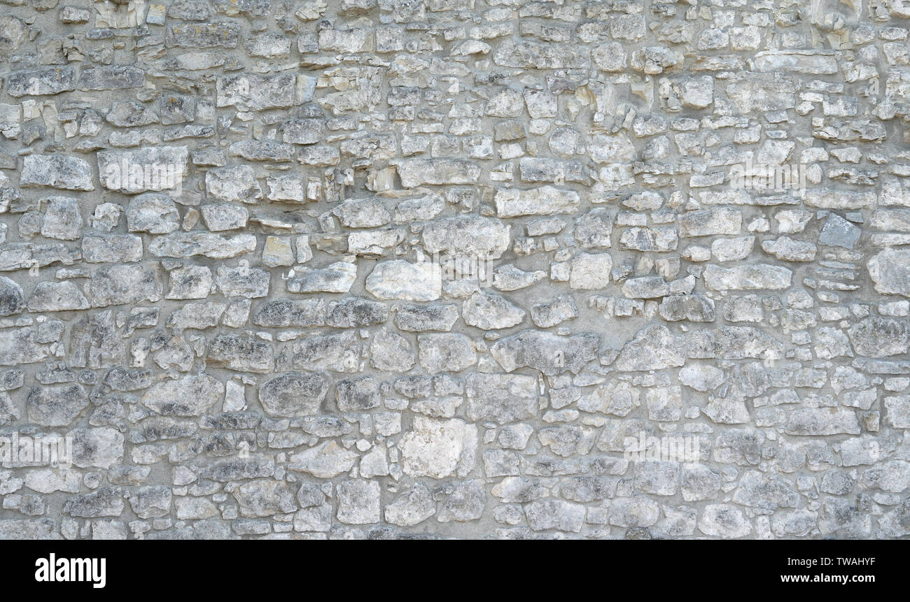 Alte Steinmauer aus grau Natursteine Stockfoto