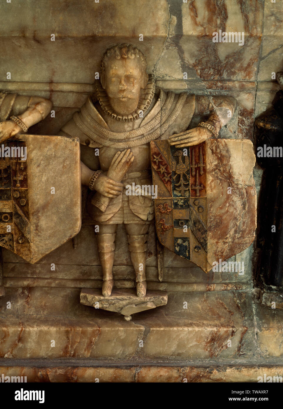 Details von einem Überlebenden, unverheirateten Sohn am Grab von Sir Humphrey Bradbourne (gestorben 1581) und Frau. St. Oswalds Kirche, Ashbourne, Derbyshire, England. Stockfoto