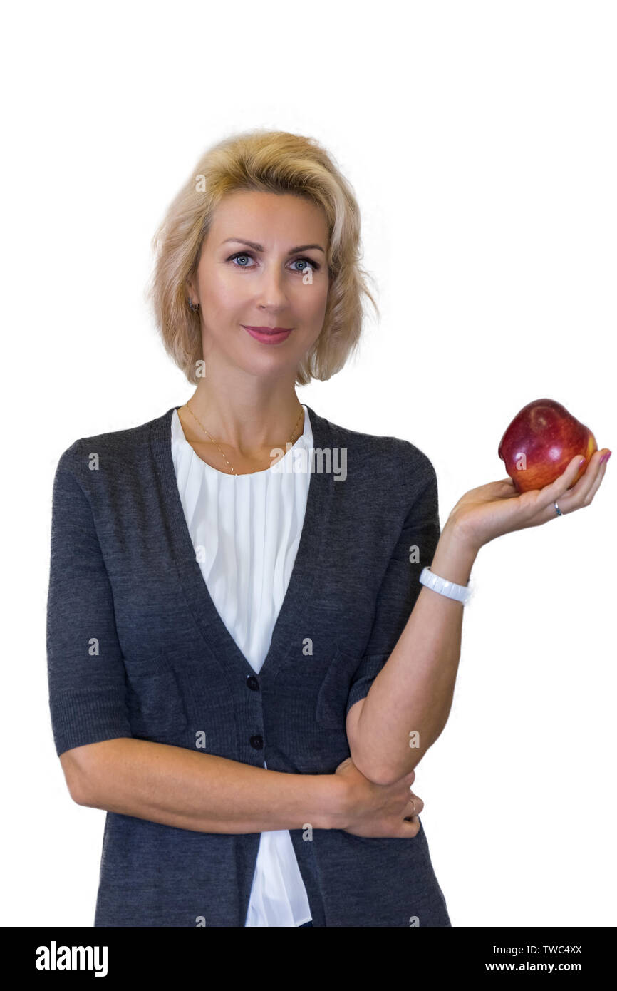 Unternehmen Portrait von einer Ernährungsberaterin kaukasisch Weiblich mit Apple auf weißem Hintergrund Stockfoto