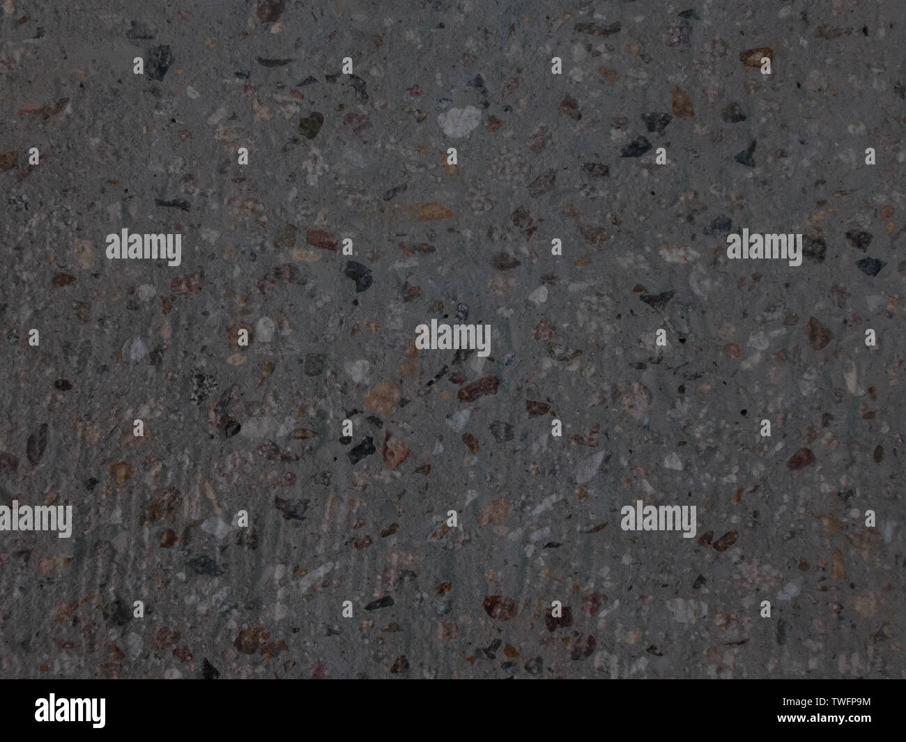 Geschliffene Beton Textur mit freiliegenden Kies Steine. Stockfoto