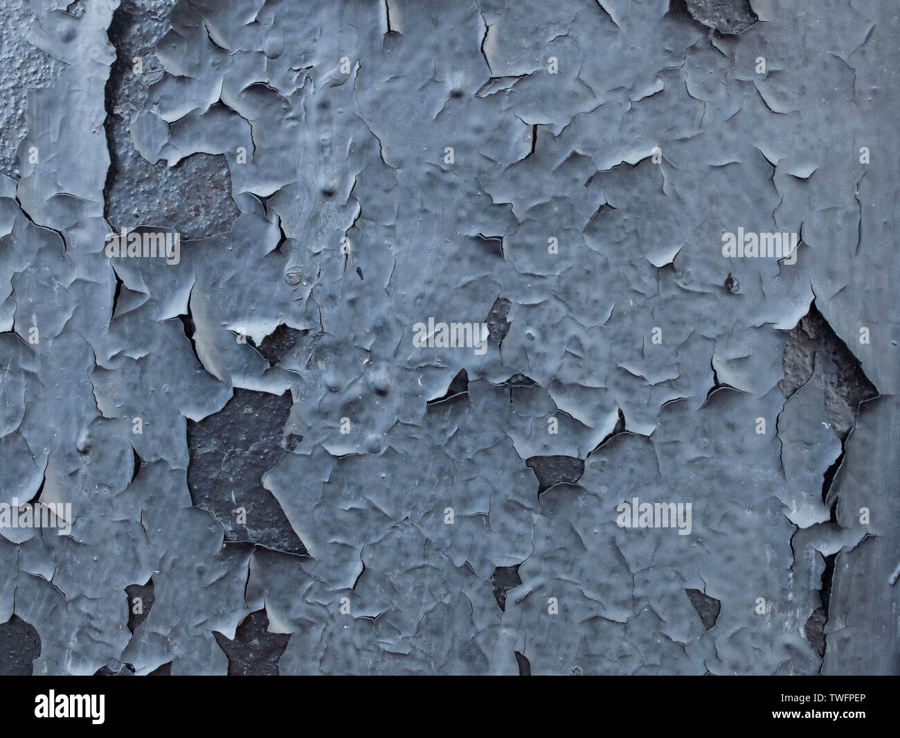 Schwarz Metallic Oberfläche mit Gecrackten exfoliated Farbe Stockfoto