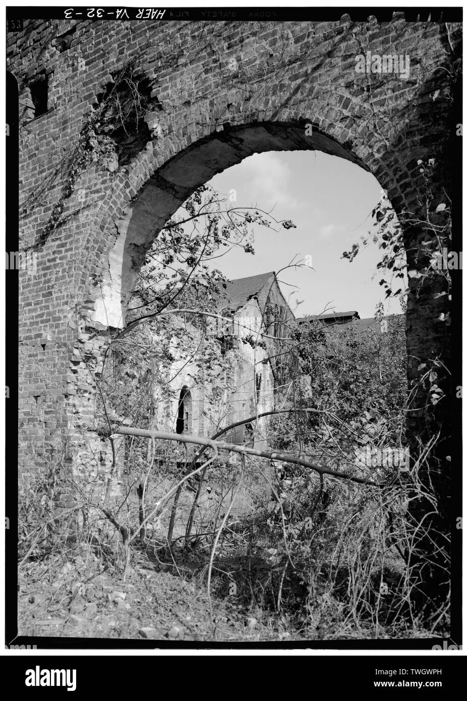Rundbogen in Mauer bei TREDAGER BÜGELEISEN FUNKTIONIERT. Beachten Sie, dass ZIEGEL IST GESCHEHEN IN DER AMERIKANISCHEN BOND. - Tredegar Iron Works, U.S. Highway 1, entlang James River, Richmond, unabhängige Stadt, VA; Anderson, Joseph Reid Stockfoto