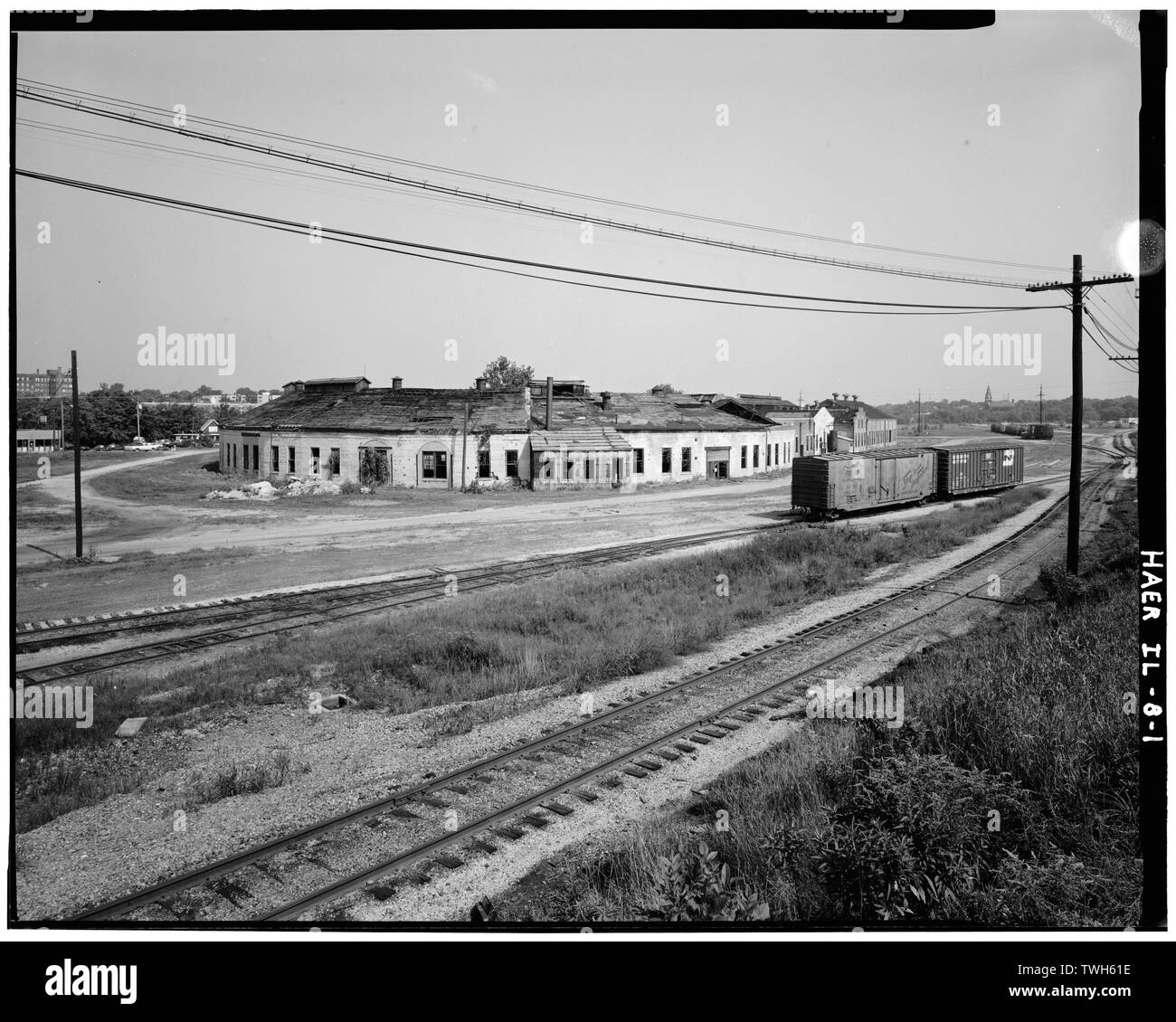 Roadhouse und Geschäfte von der Chicago, Burlington und Quincy Railroad Hauptlinie, nach Nordosten - Chicago, Burlington und Quincy Railroad, Roundhouse und Geschäfte, Broadway und Spring Street, Aurora, Kane County, IL Stockfoto