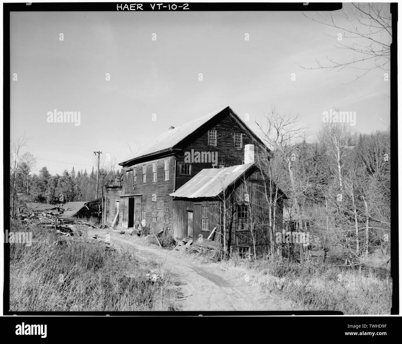 SE- und SW-erhöhungen - Blick nach Norden zeigen Holzbearbeitung Mühle und Schmiede - Ben's Dreschmaschine Mühle, Staatliche Beihilfe Nr. 1, Barnett, Caledonia County, VT; Laurance Rockefeller, S; Jack, Alexander; Judkins, James Loren; Stevens, Willard; Stevens, Henry; Gleason, Samuel; Barnett Baumwolle und Wolle Manufacturing Company; Herrin, John; Greenbank, Thomas; Greenbank, George; Taylor, James; Goodwillie, James; Shaw, William; McLaren, James; Somers, James S; Alexander Jack's Färben und Drucken funktioniert; Smith, Isaac M; Bischof, Ora; Ford, Elmer S; Judkins, Fenton; Judkins, Donald; Pioneer Electric Light Company; Stockfoto